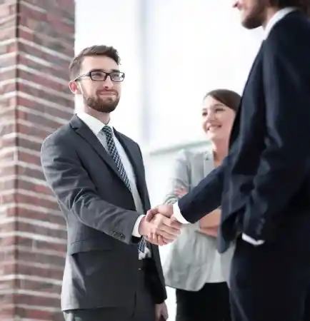 a person shaking hands with a person